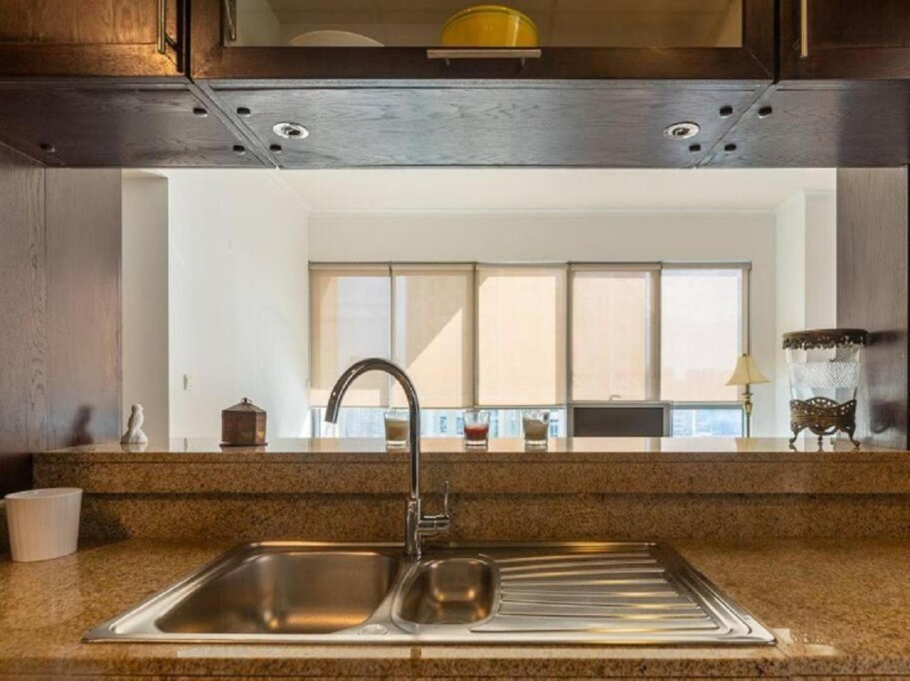 Apartamento Elegant Overlooking Mall Fountain. Dubái
