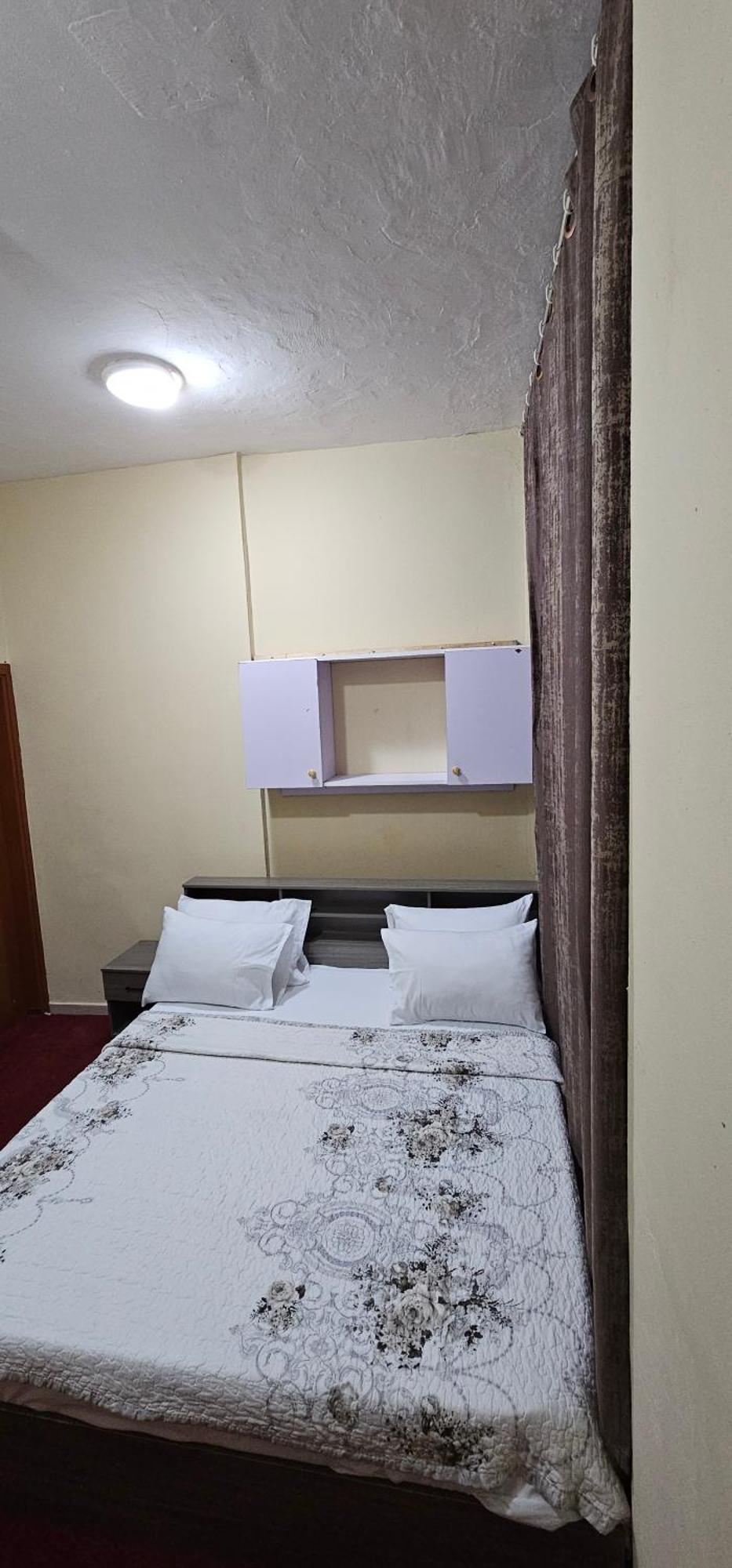 Benitah Partitions And Family Habitación en casa particular