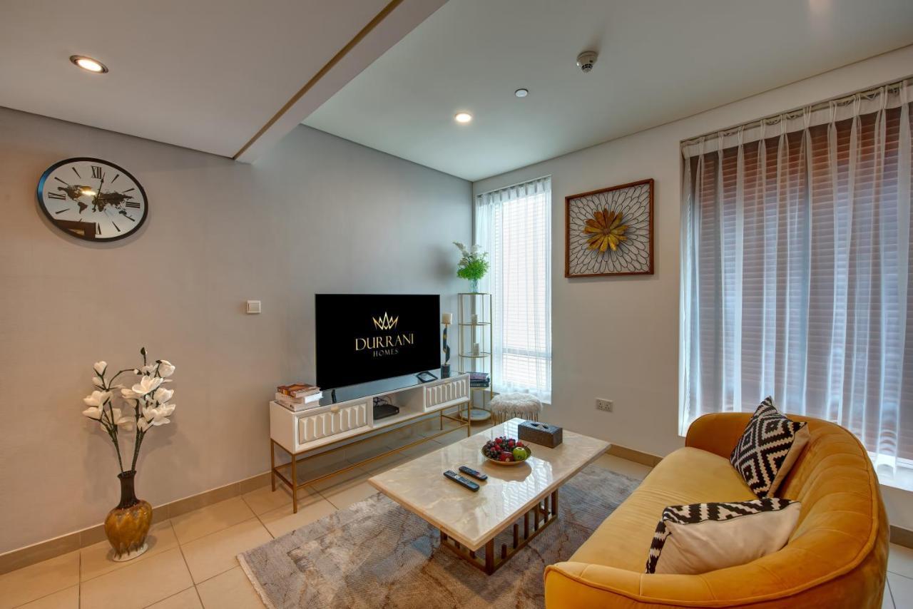 Durrani Homes - Iconic Burj Views Living Dubái