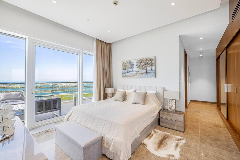 Apartamento Private Beach - 4br - 8 Sleep - Pool - 180 Grades Sea & Ain View - Huge Balcony - Parking - Prime Location Dubai