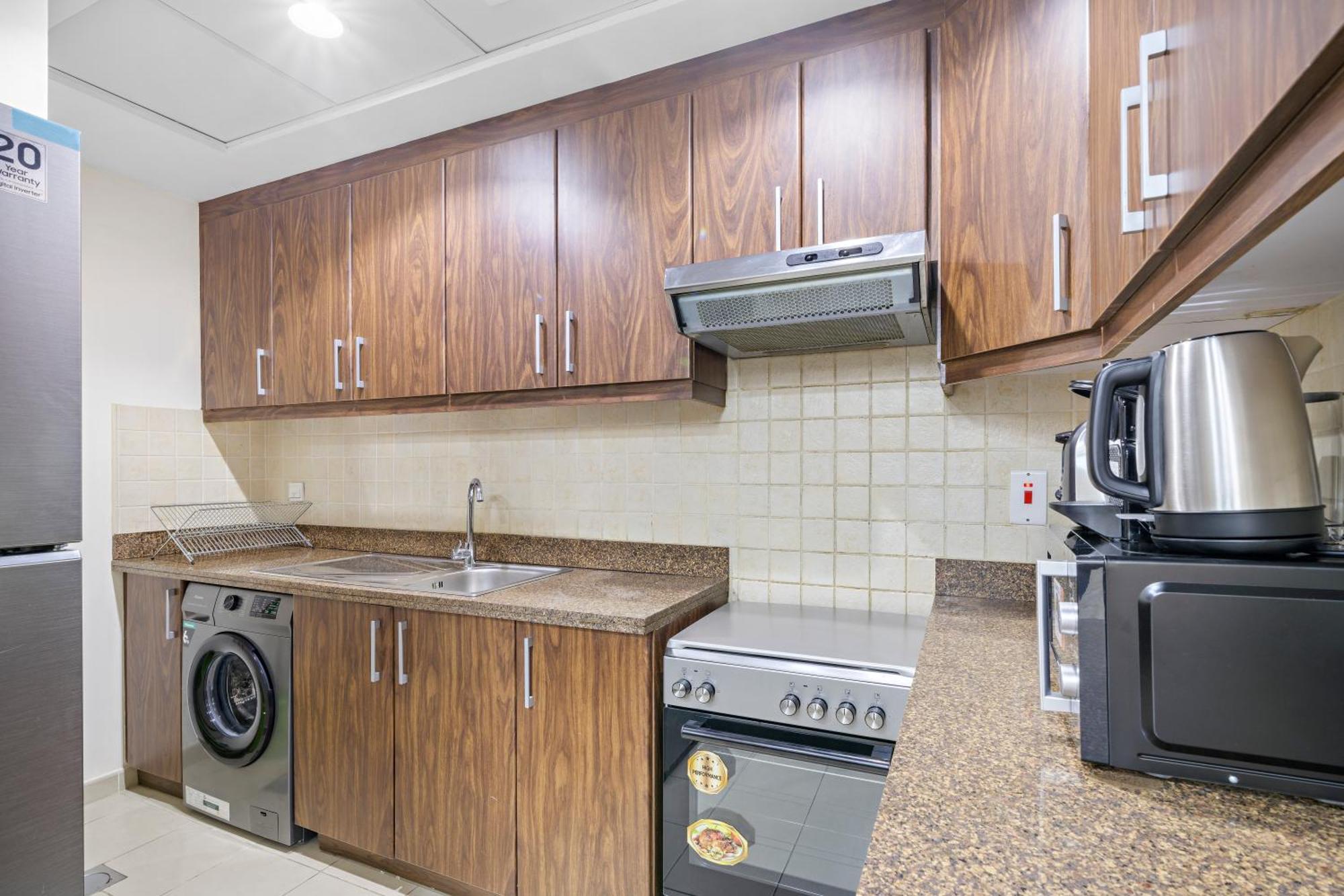 A-living Cozy 1br Retreat With Balcony & Burj Khalifa Views At Executive Tower-1702 Apartamento