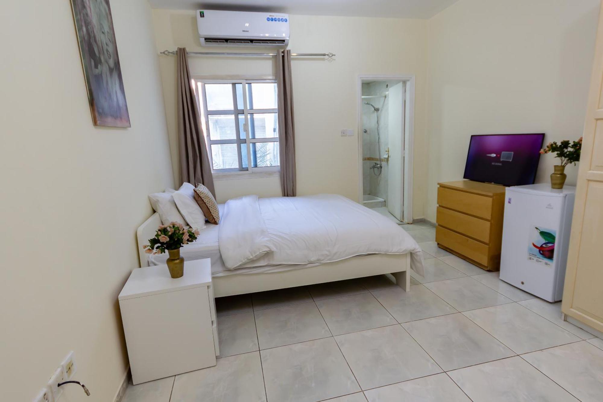 Habitación en casa particular Relaxing Private In Compound Housing Near Burj Alarab 124 Dubái