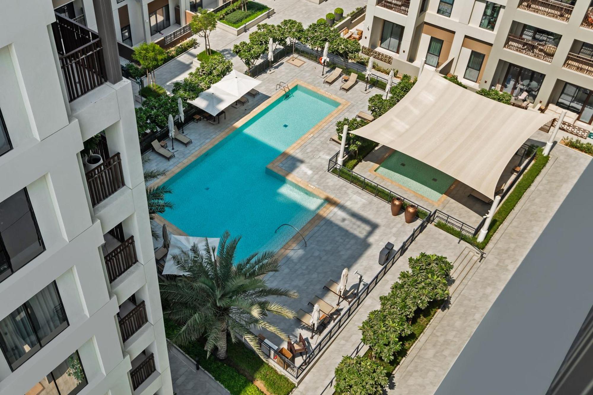 Stylish Poolside In Creek Harbour - By Dustay Apartamento Dubái