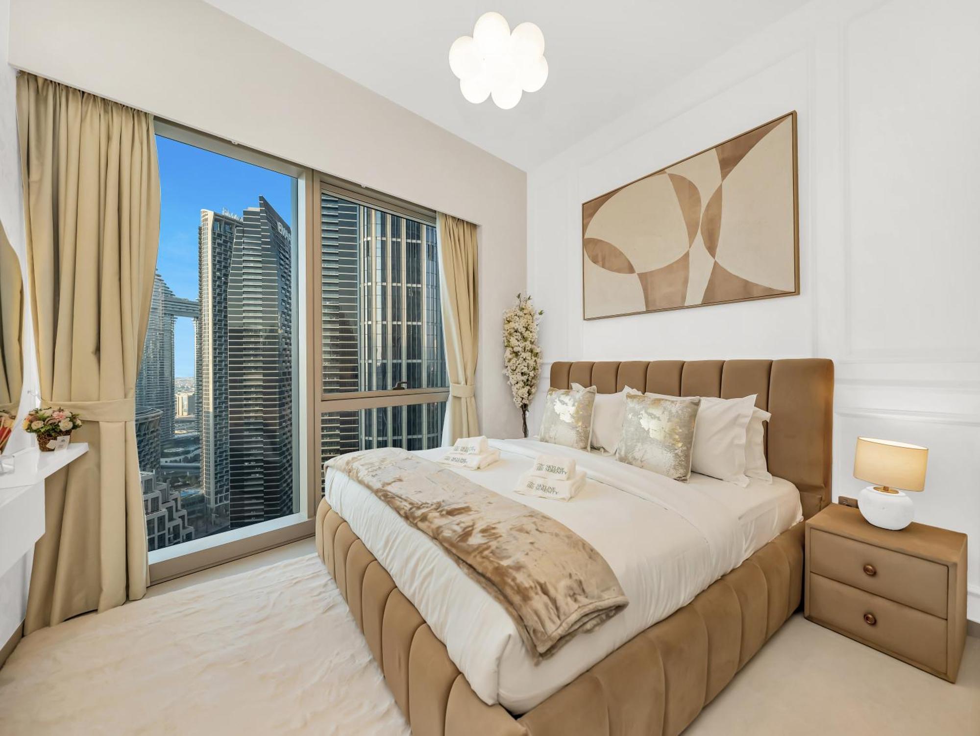Grandeur 2 Bedroom I Burj Khalifa & Fountain Views I Free Parking, Gym, Pool, Wi-fi & Ps5 I By Skyline Serenity Dubái