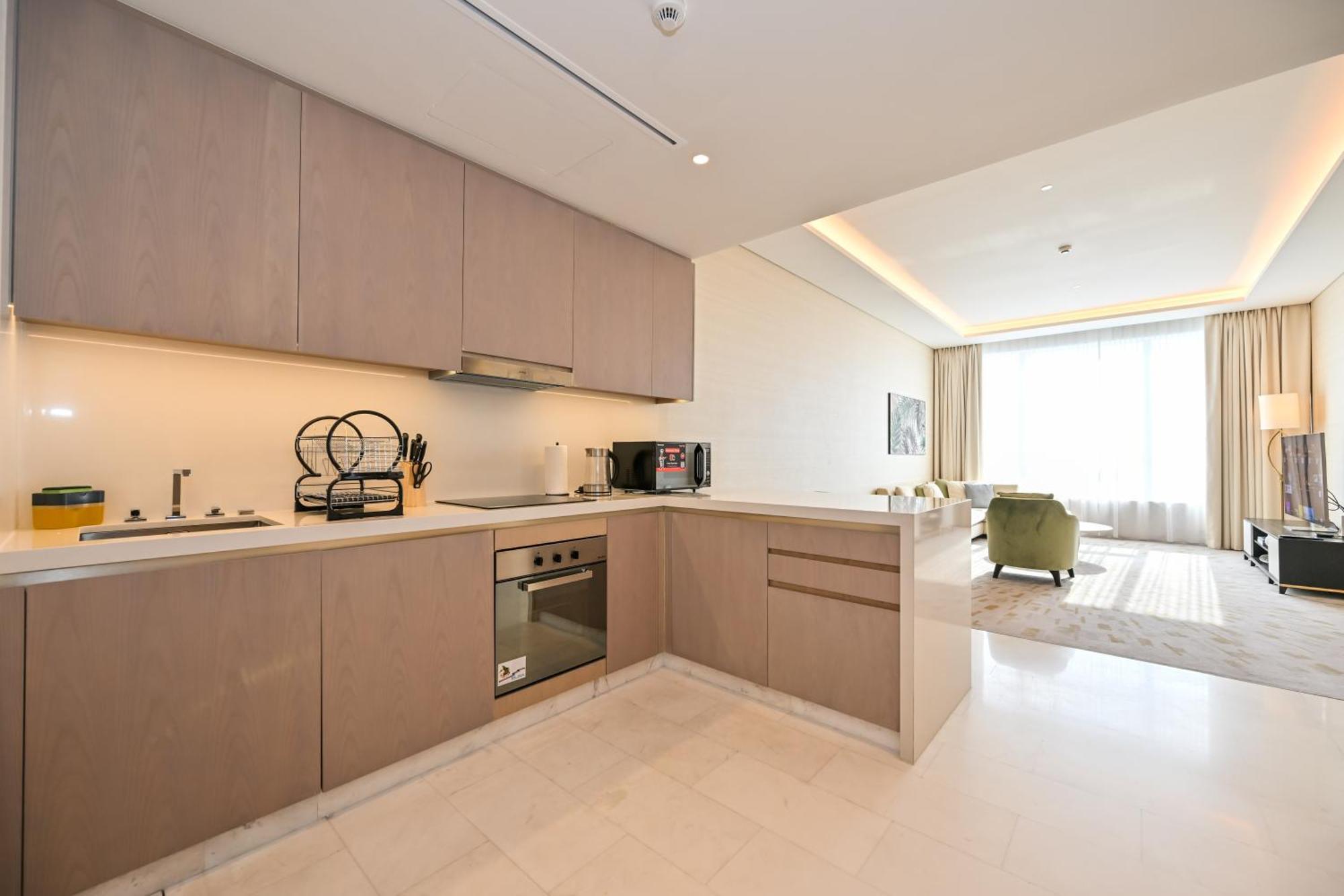 Apartamento Stylish 1-br Retreat With Sweeping Views In Palm Tower Dubai