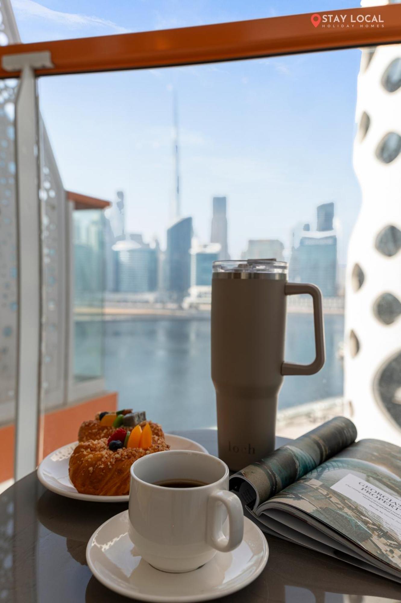 Iconic Canal & Burj View Central, Scenic Serene *