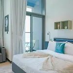 Stylish Loft With Balcony Overlooking City Views