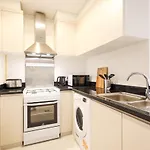 Elite Lux Holiday Homes - Serene Golf View Living 1 Bhk In Damac Hills Dubai