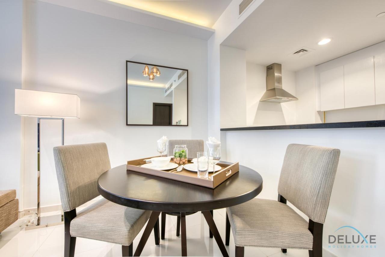 Sleek 1br At Celestia South By Deluxe Homes Lägenhet *