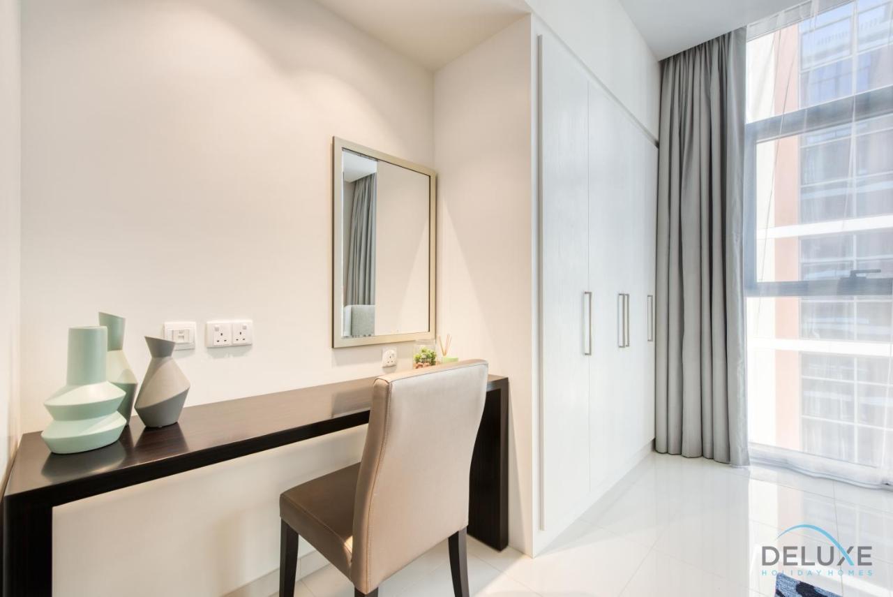 Sleek 1br At Celestia South By Deluxe Homes Lägenhet *