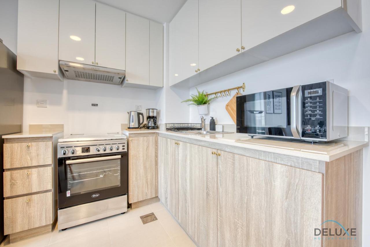 Appartement Charismatic 1br At Town Square Dubailand By Deluxe Homes
