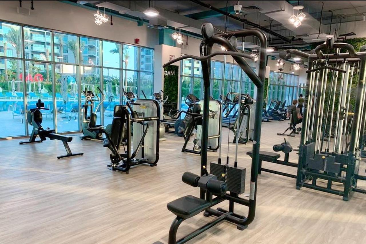 Elite Lux Homes - Cozy & Stylish 1 Bedroom With Huge Pools & World Class Gym Dubaï