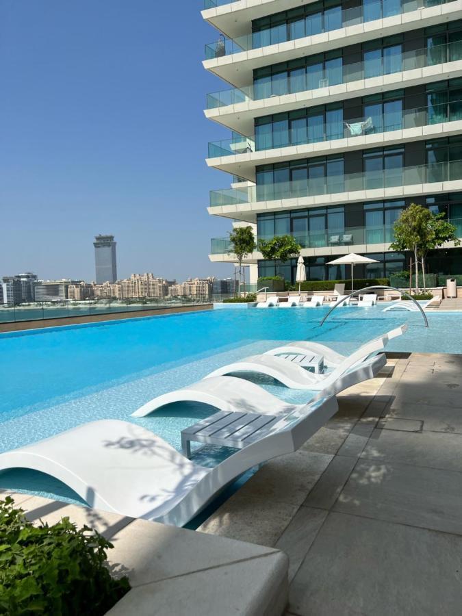Stunning 1br Apt High Floor With Palm View & Private Beach At Emaar Beachfront Dubaï