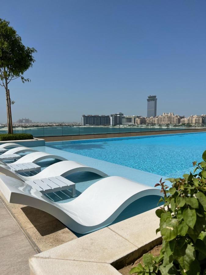 Stunning 1br Apt High Floor With Palm View & Private Beach At Emaar Beachfront