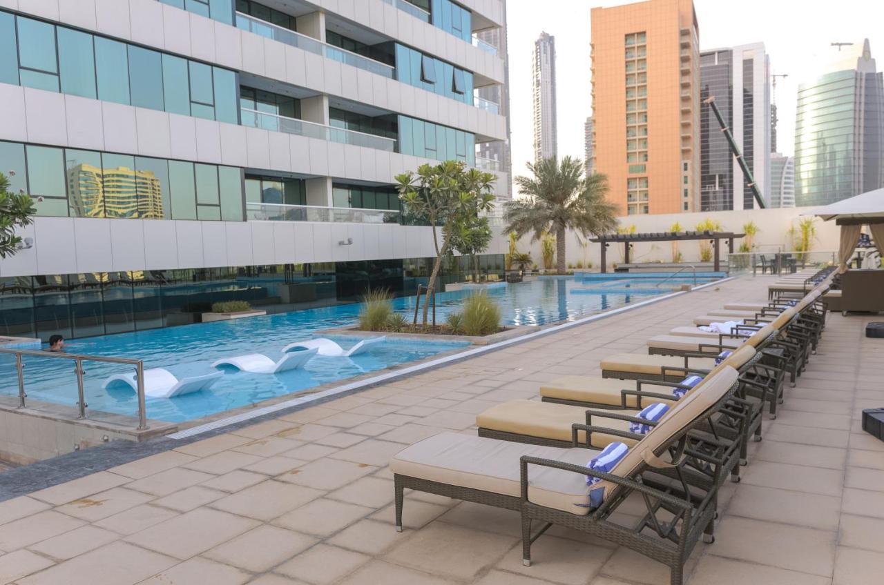 Apartamento Oskena Vacation Homes-damac Maison Canal View Dubái
