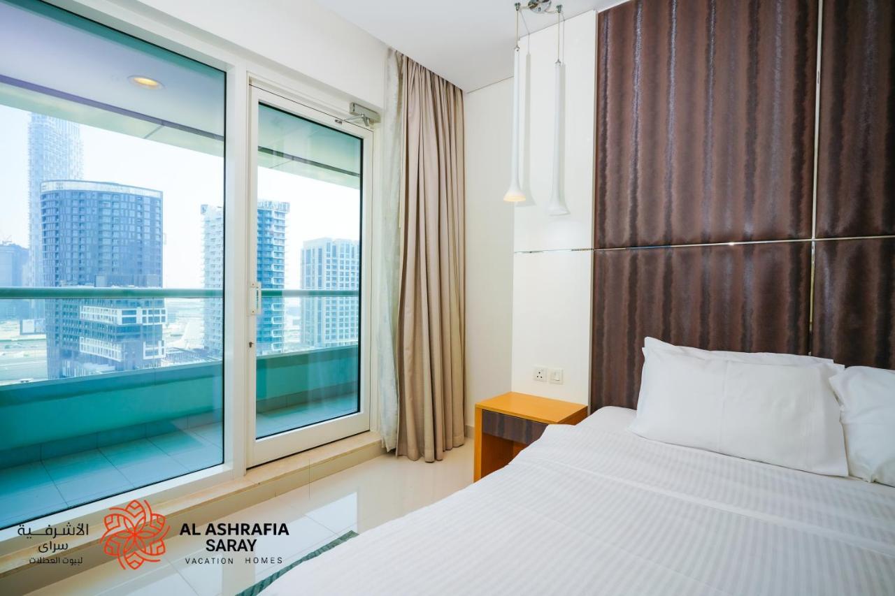 Apartamento Alashrafia Saray - Superb 1 Bedroom In Canal Views Dubái