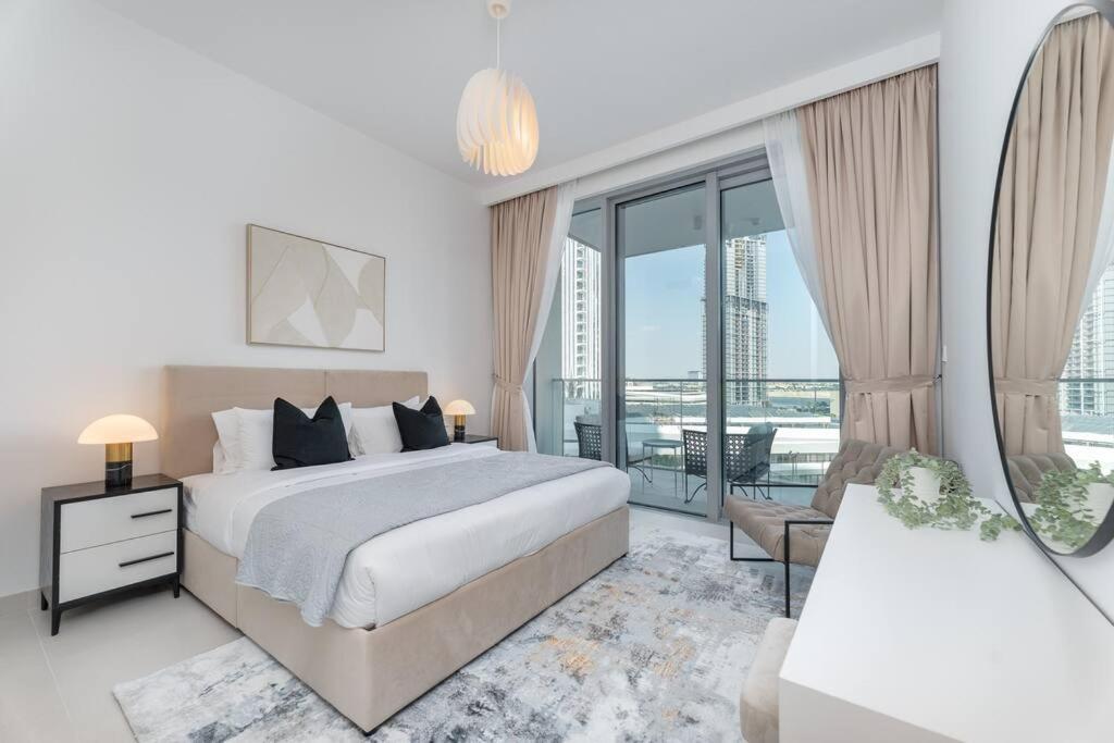 Vogue Waterfront Living - The Grand Creek Harbour Apartament
