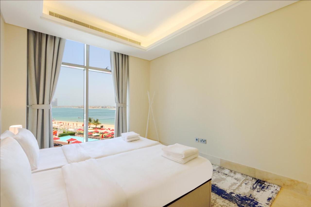 Modern 2Br With Beach Access & Scenic Atlantis Views *