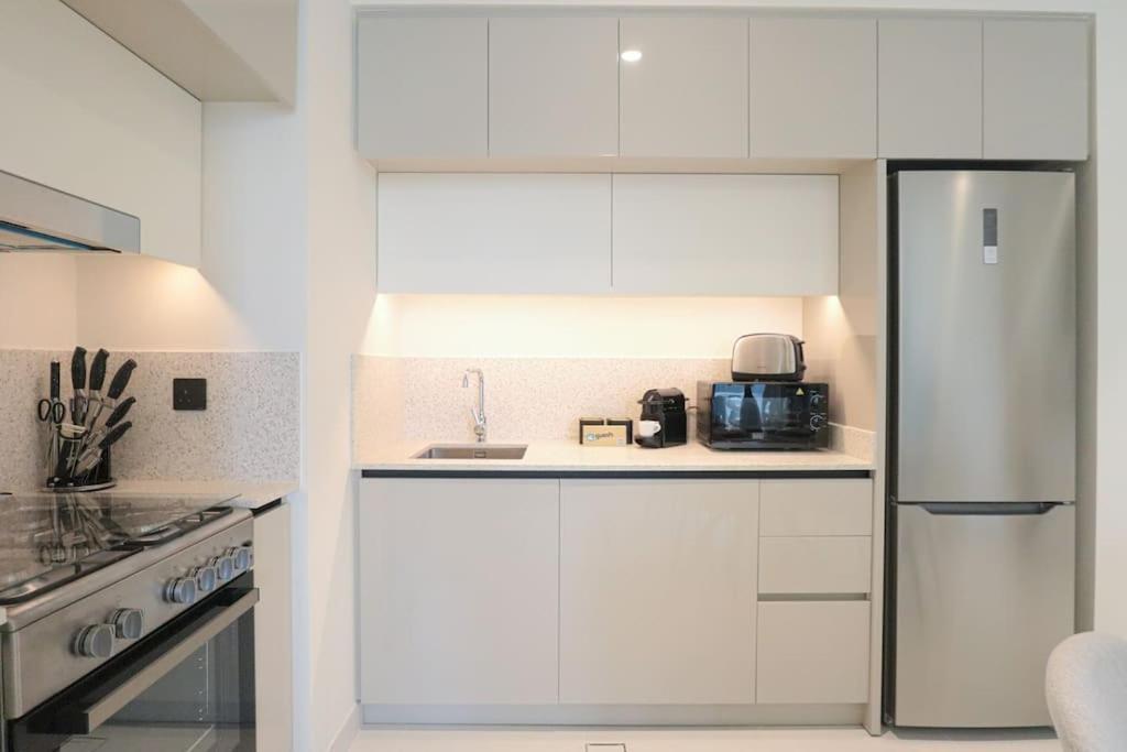 Appartement Higuests - Emaar Beachfront Haven With Majestic Marina Views *