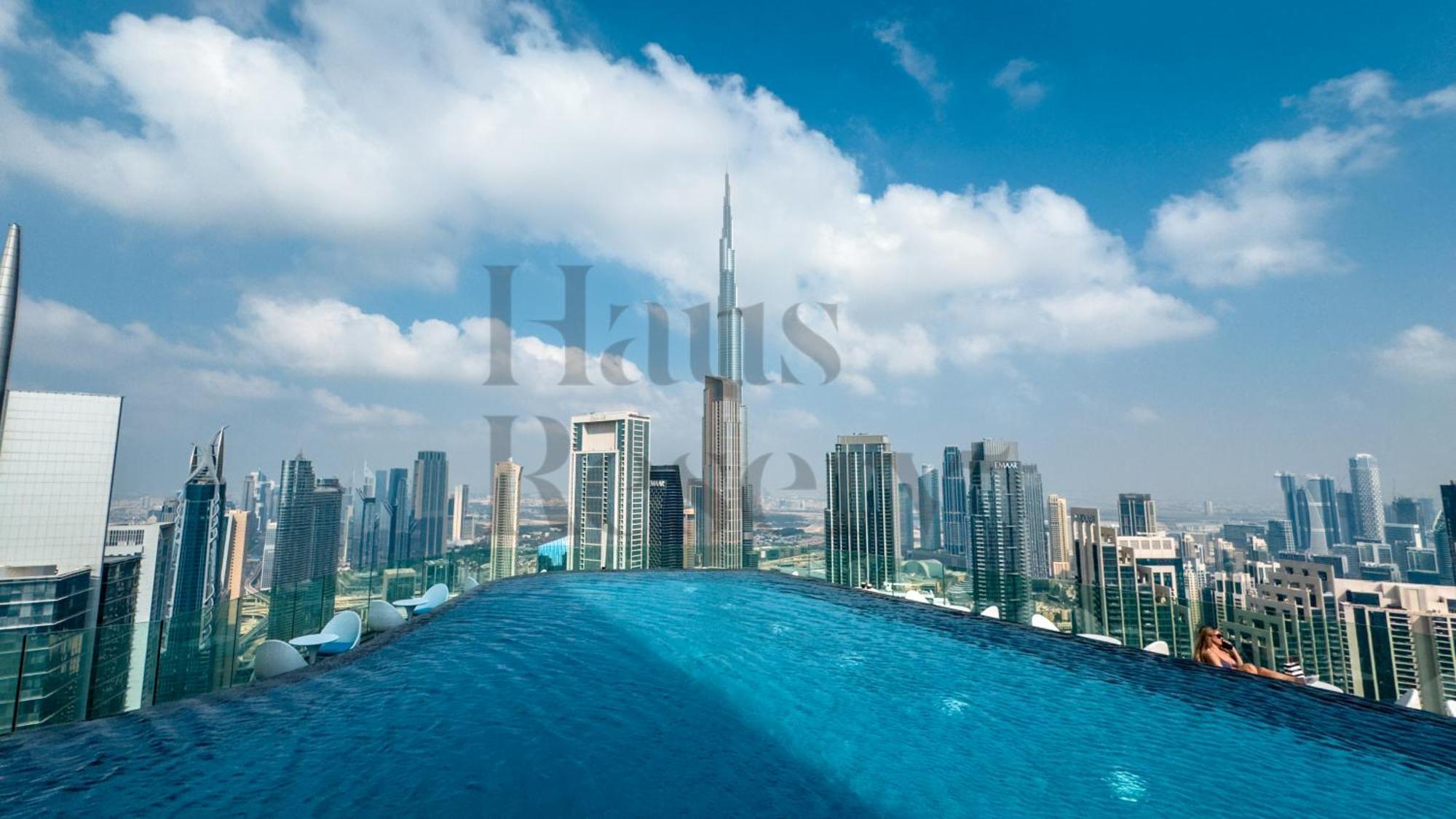 Hausreserv At Paramount Midtown - Infinity Pool With Burj Khalifa View - Luxury Apartemen Dubai