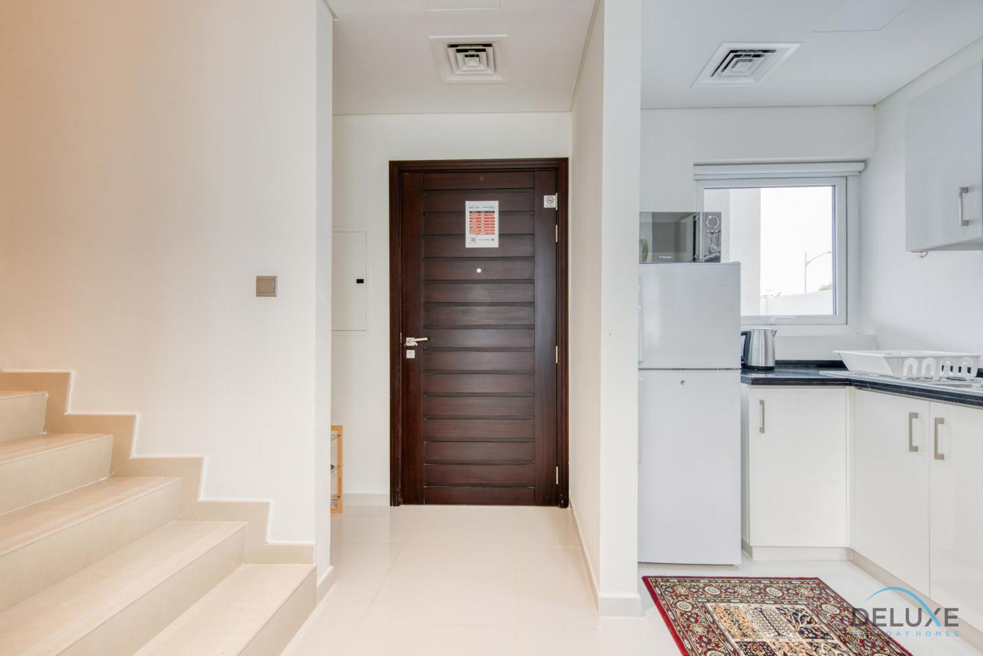 Tranquil 3br Townhouse At Albizia Damac Hills 2 By Deluxe Homes Appartement