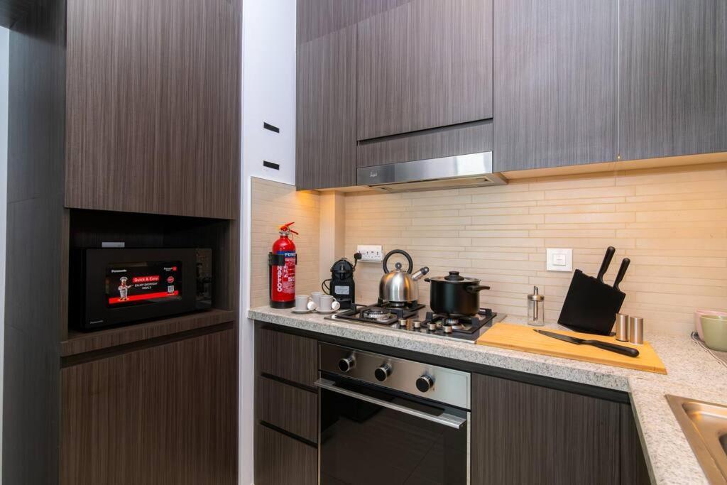 Apartamento Elite Escape - 1 Bhk Getaway With Mall Access - 1502 Dubái