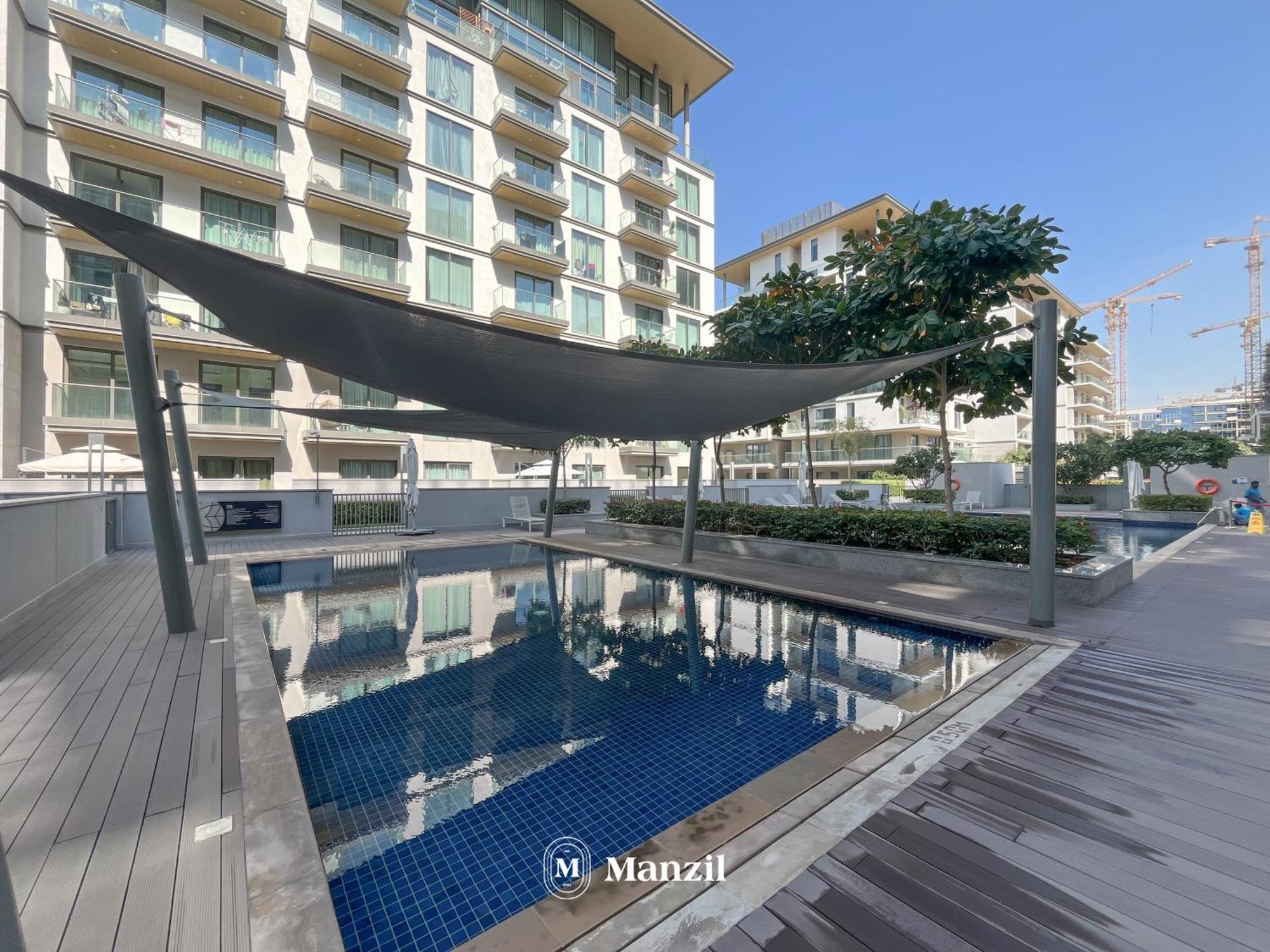 Lägenhet Manzil - 1br In Sobha Hartland With Pool View, Near Burj Khalifa And Mall Dubai