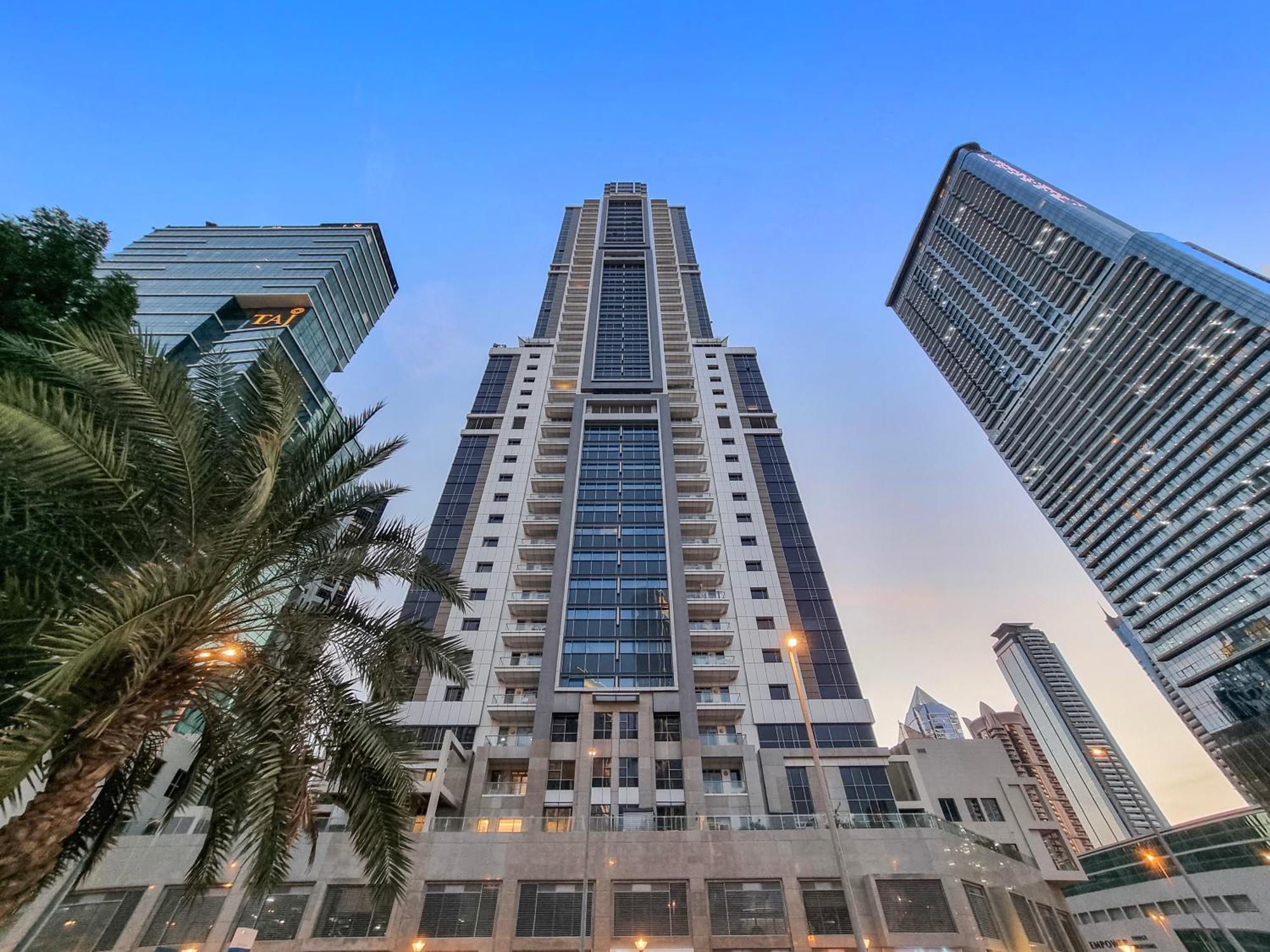 Appartement A-living Cozy 1br Retreat With Balcony & Burj Khalifa Views At Executive Tower-1702