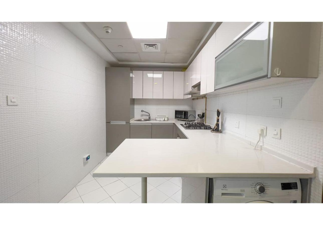 Apartamento Homesgetaway-cozy In Glitz 1 By Danube Dubái
