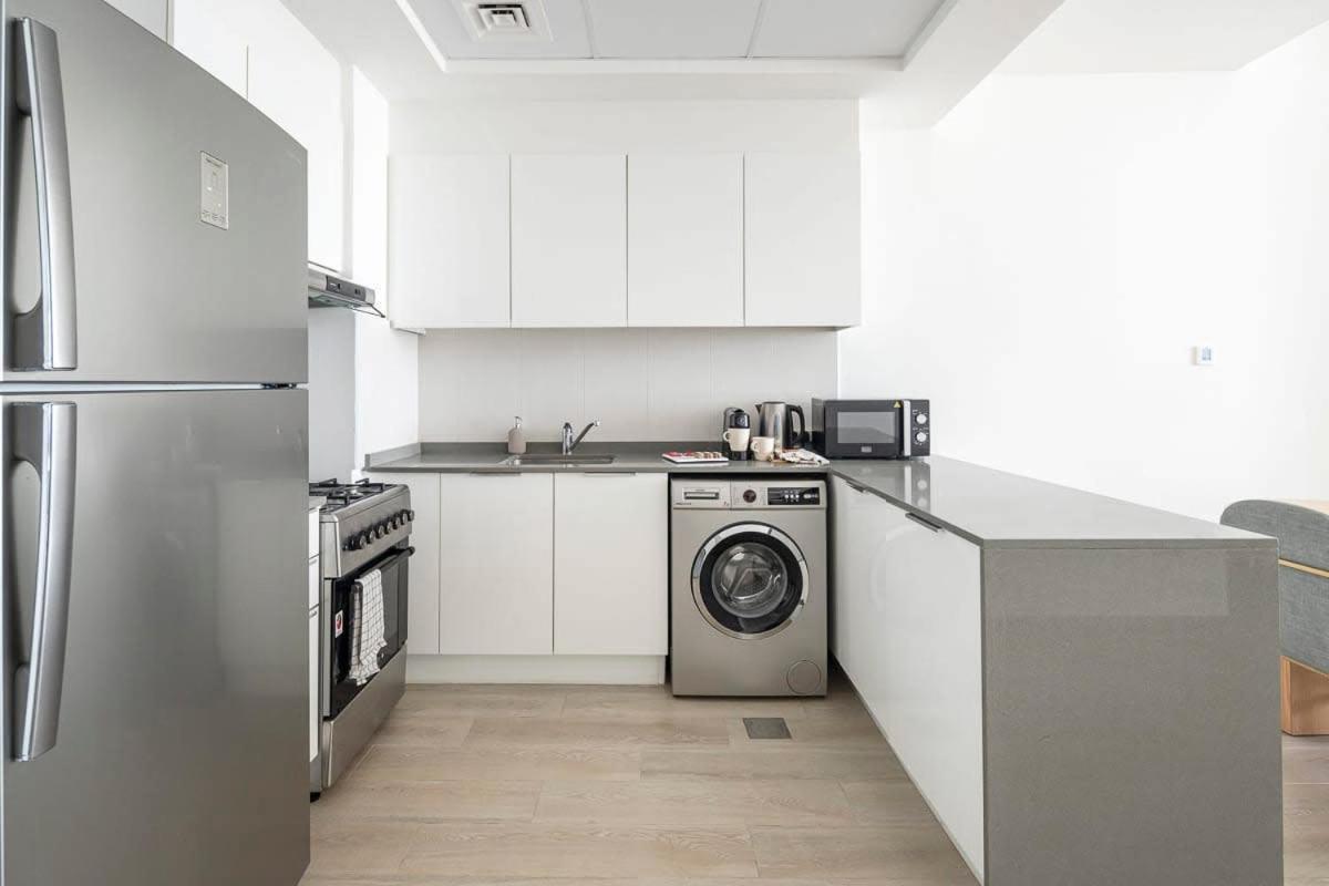 Frank Porter - Bloom Tower Appartement Dubaï