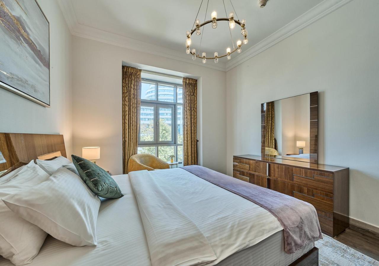 Burj Khalifa Partial View Peak Living Luxury 2br Souk Al-bahar Beside Mall-golden Homes Apartament Dubai