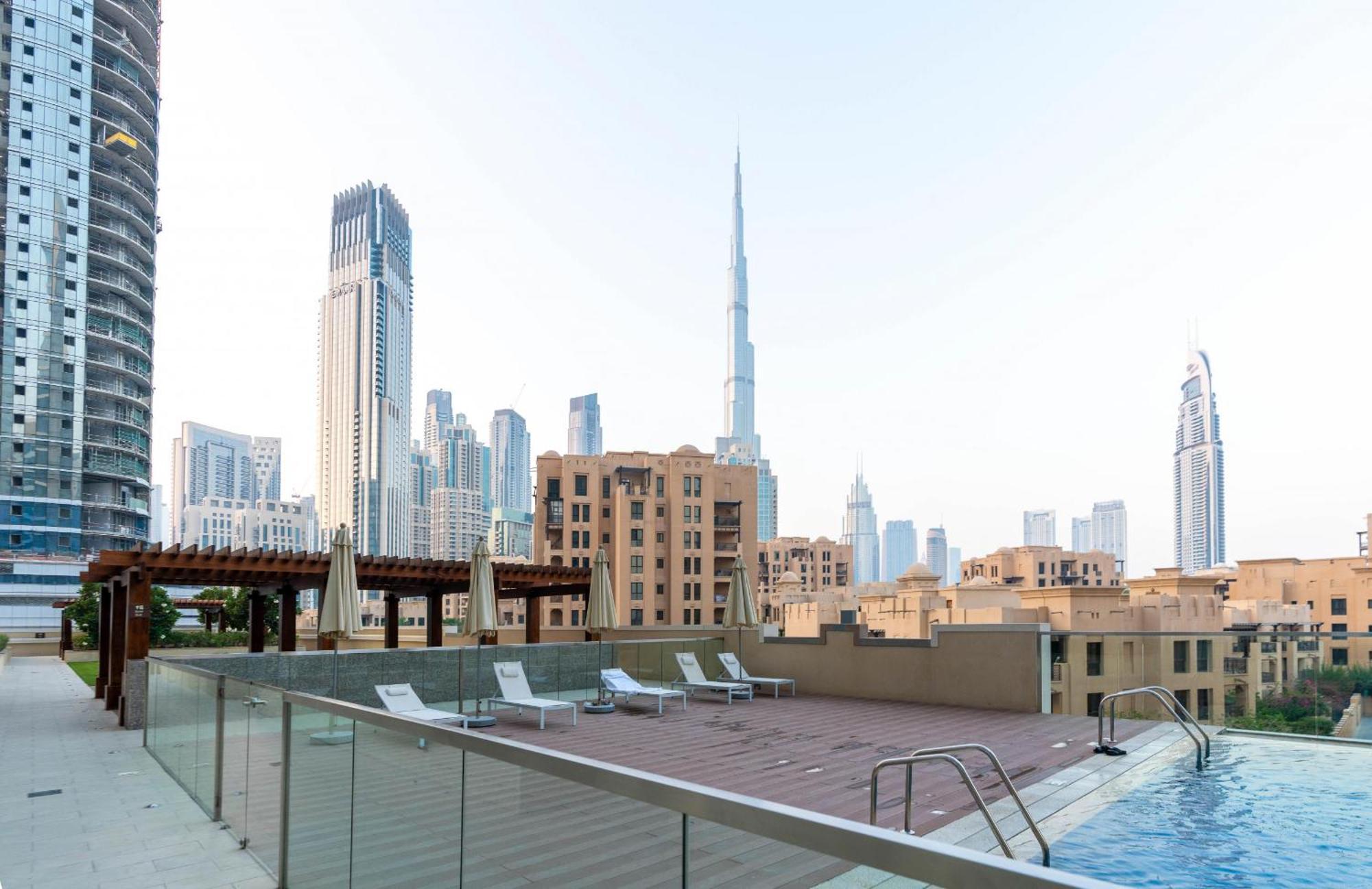 Ultimate Bay View: Burj Khalifa Pool Retreat Apartment