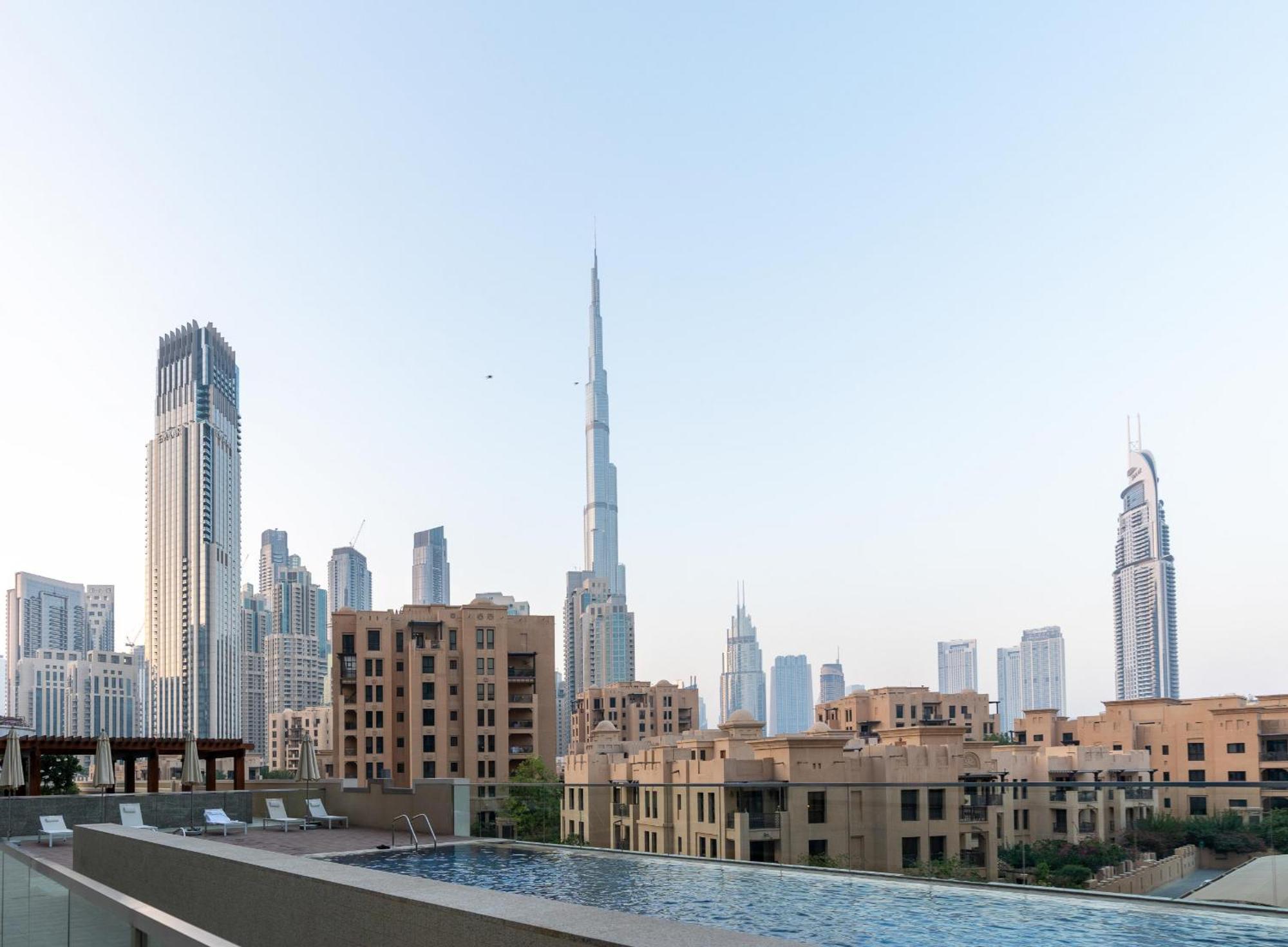 Ultimate Bay View: Burj Khalifa Pool Retreat Apartment Dubai