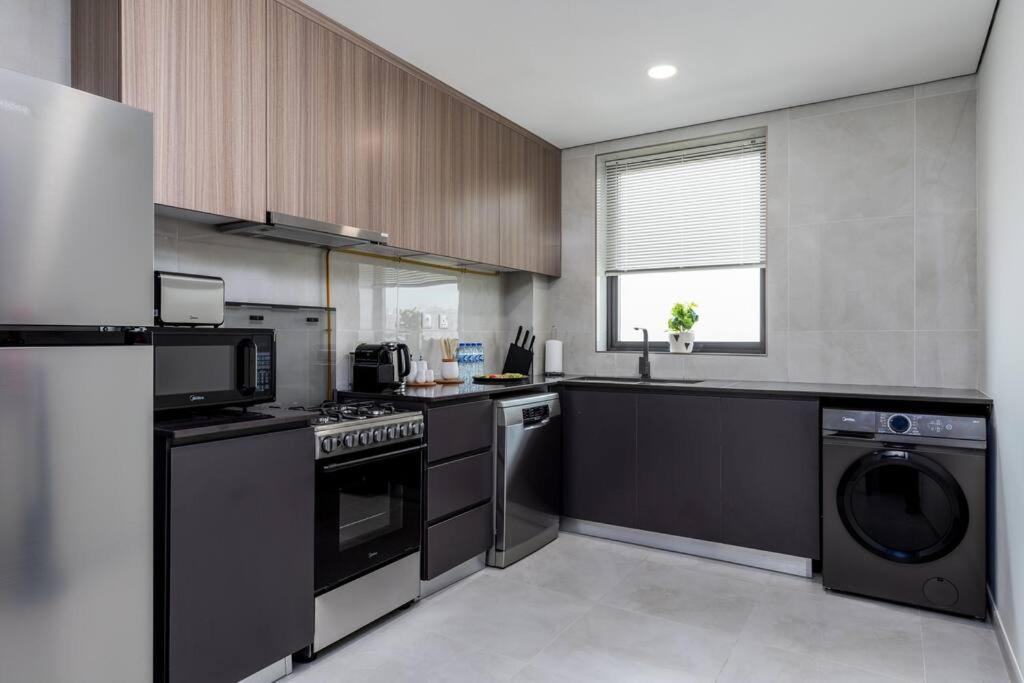 Appartement Waves - Stylish 1br Close To Img World & Global Village Dubai