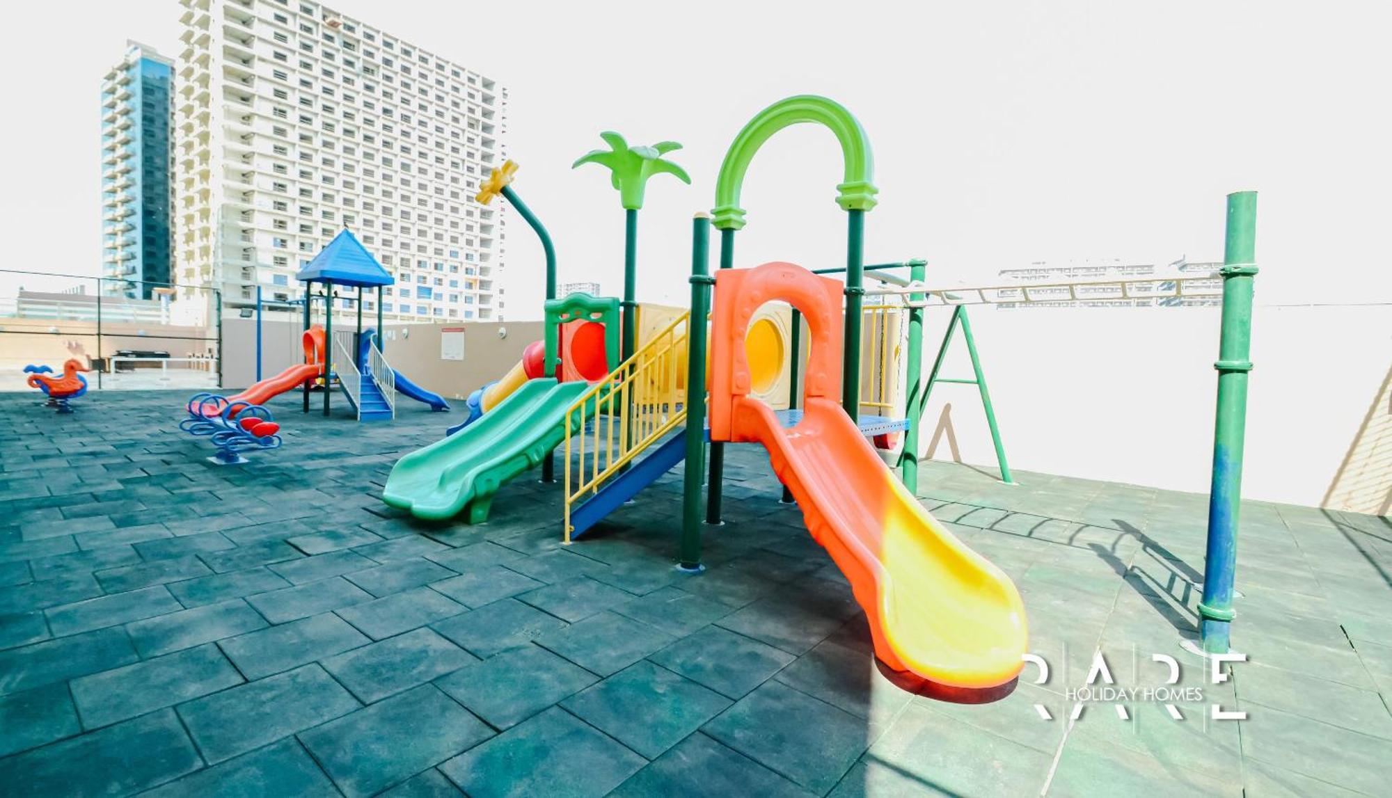 Appartement Rare Holiday Homes - Near The Lake - Lago Vista B - Dubai Production City - Impz - R2112 *
