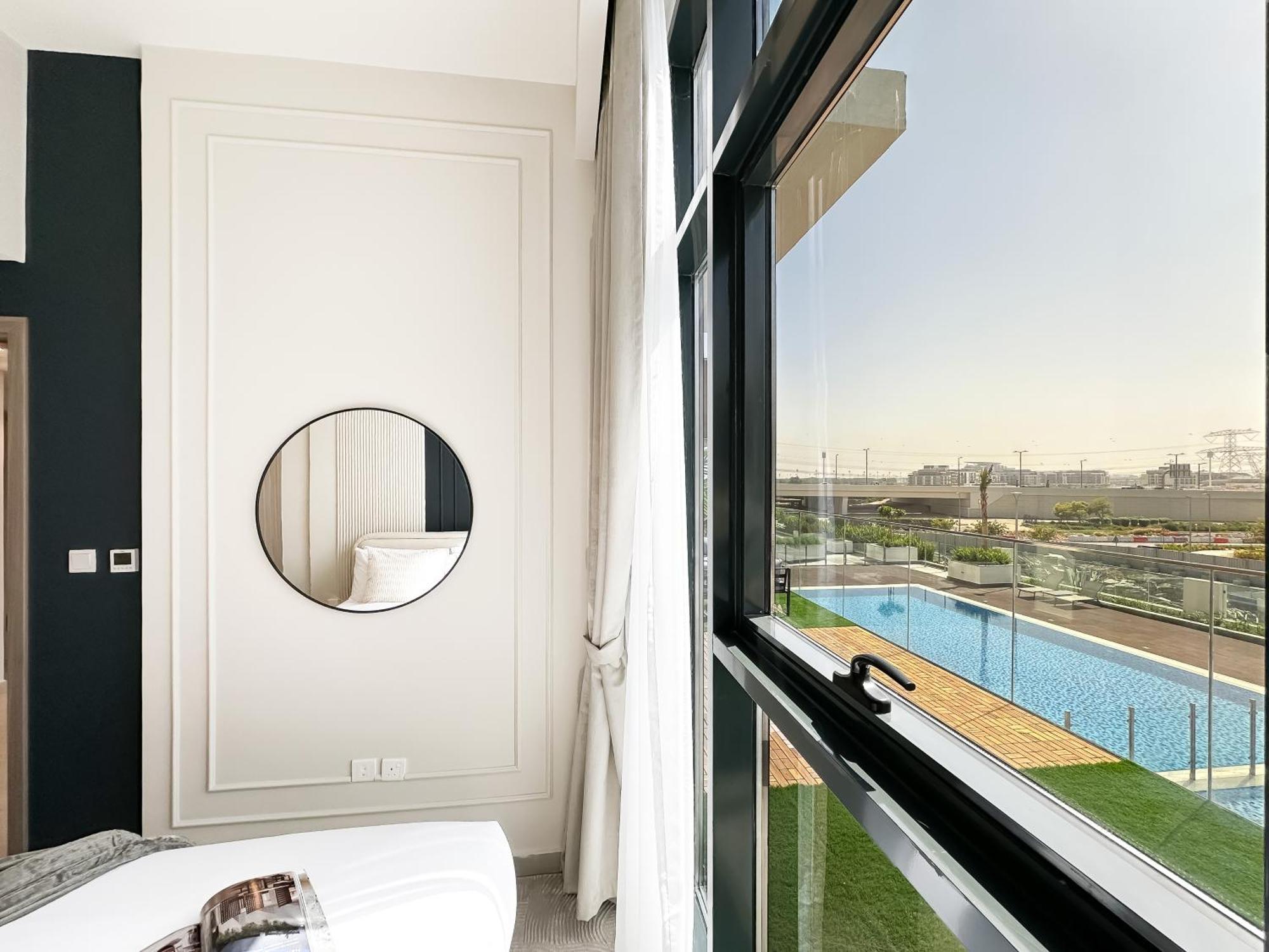 Apartamento Exquisite 2br Oasis W Pool View In Meydan Dubái