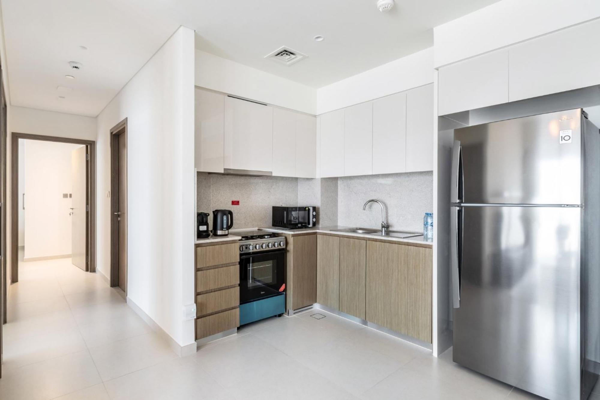 Exclusive 4 Bedroom I Burj Khalifa And Fountain Views I Free Wi-fi, Pool, Gym & Parking I By Meerak Apartamento Dubái