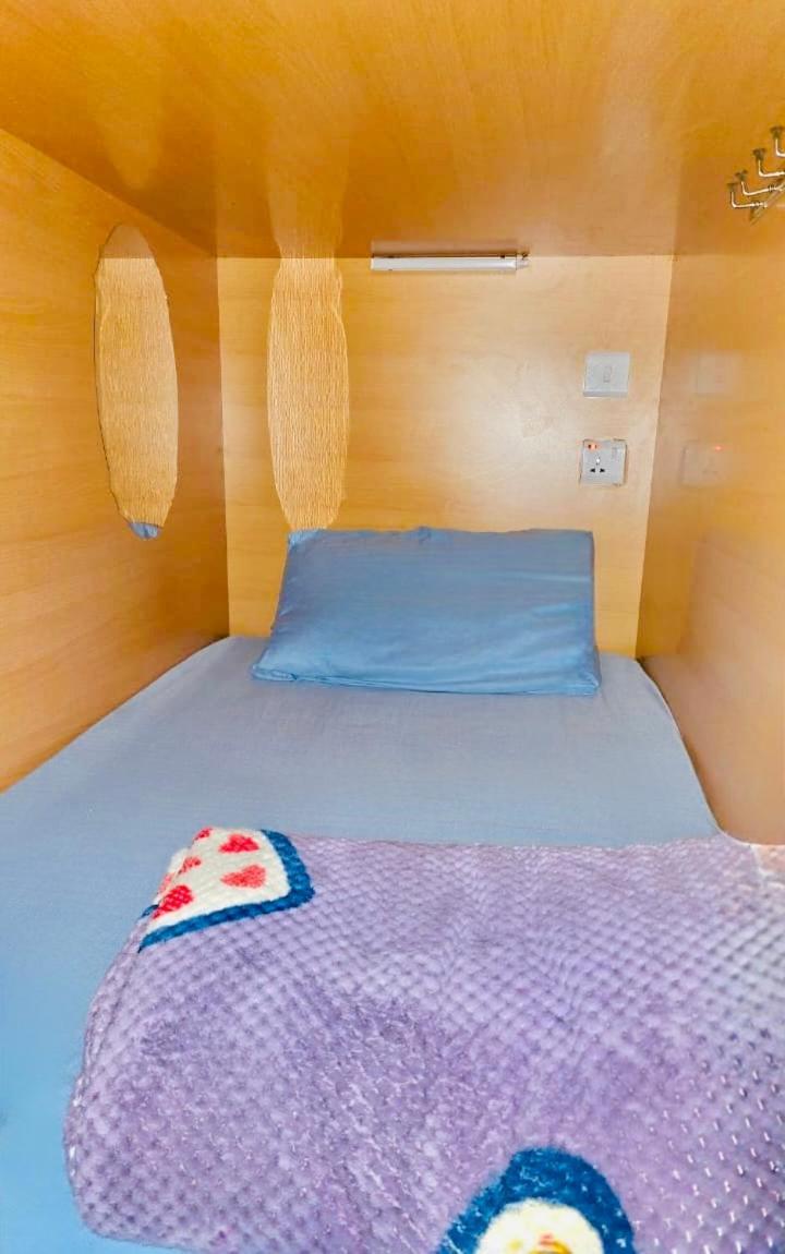 Habitación en casa particular The Five Capsule *