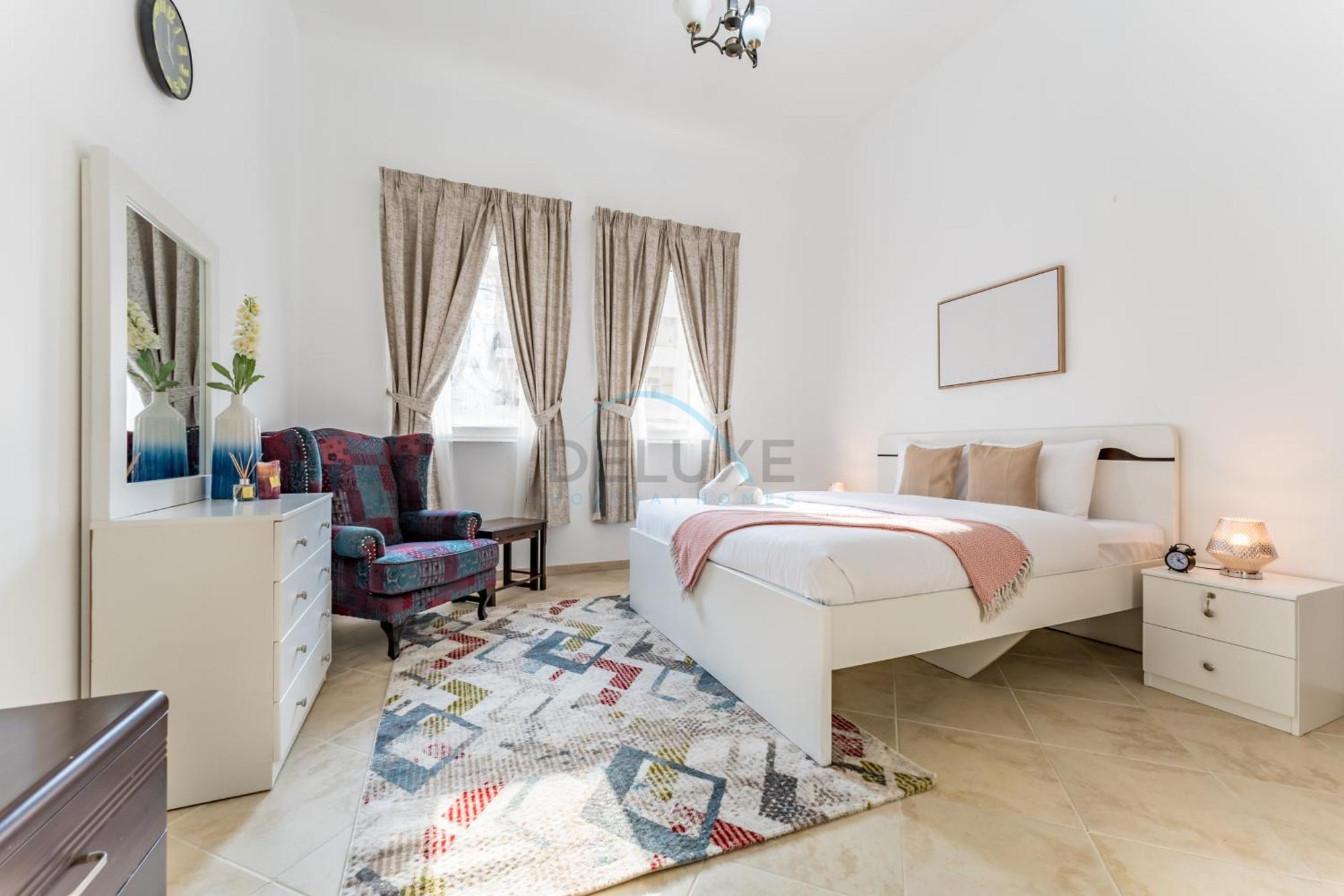Appartement Community View 2br With Private Balcony Near Golf Club, Sherlock House 2, Motor By Deluxe Homes Dubaï