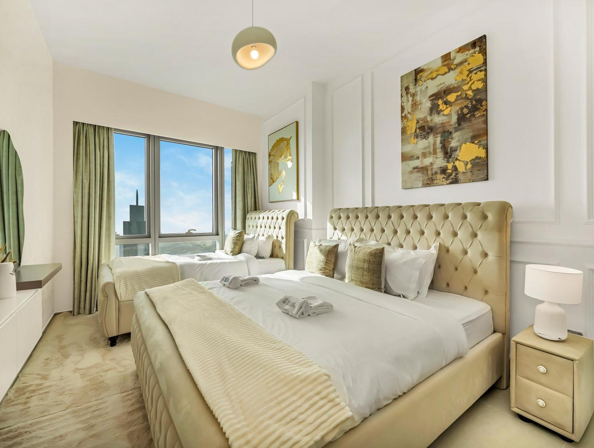Grande Signature 2 Bedroom I Persian Gulf Views I Free Parking, Gym, Pool, Wi-fi & Ps5 I By Skyline Serenity *