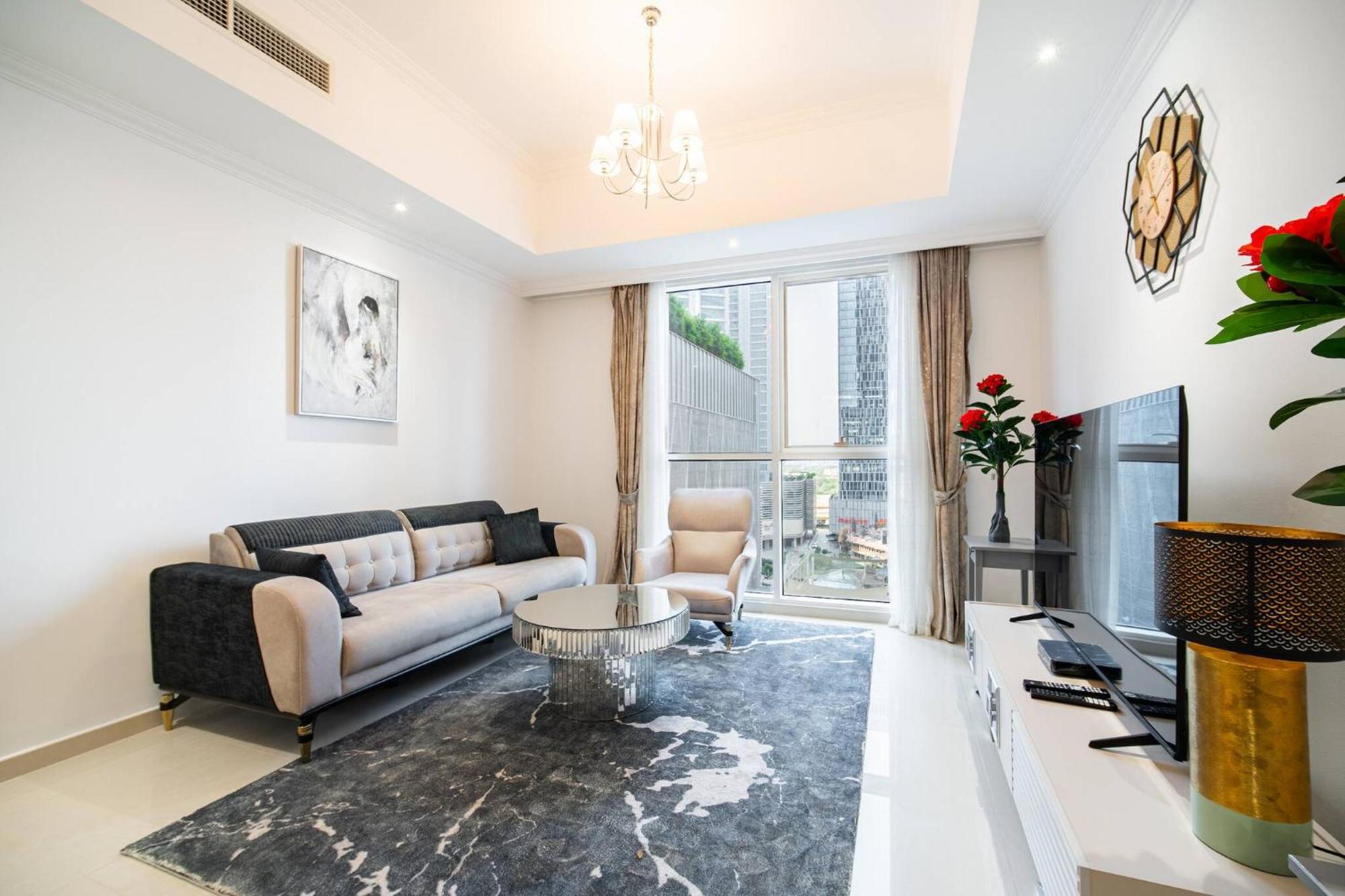 Elegant Escapes - Homely 1b In Dunya Tower Appartement Dubai