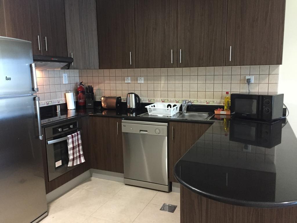 Espace Holiday Homes - Elite Residency Appartement *