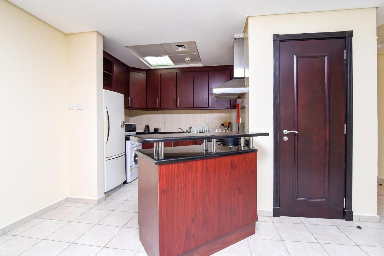 Oyo 163 Discovery Garden View Appartement Dubaï
