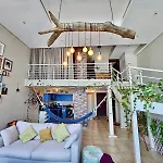 Urban Oasis Stylish Loft Abundant Natural Light