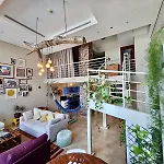 Urban Oasis Stylish Loft Abundant Natural Light