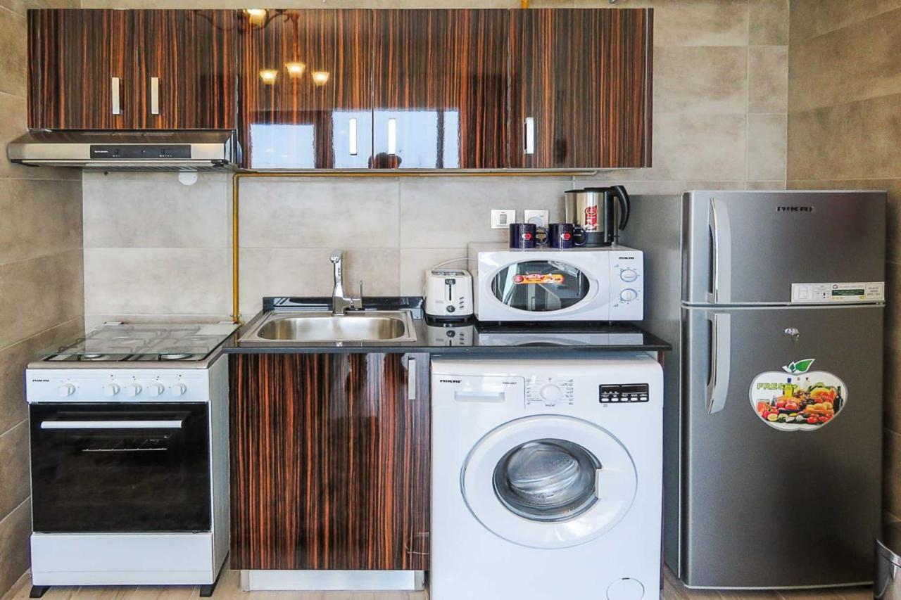 OYO 860 Home MAYA 4 TOWER - Studio, JVT * Dubai