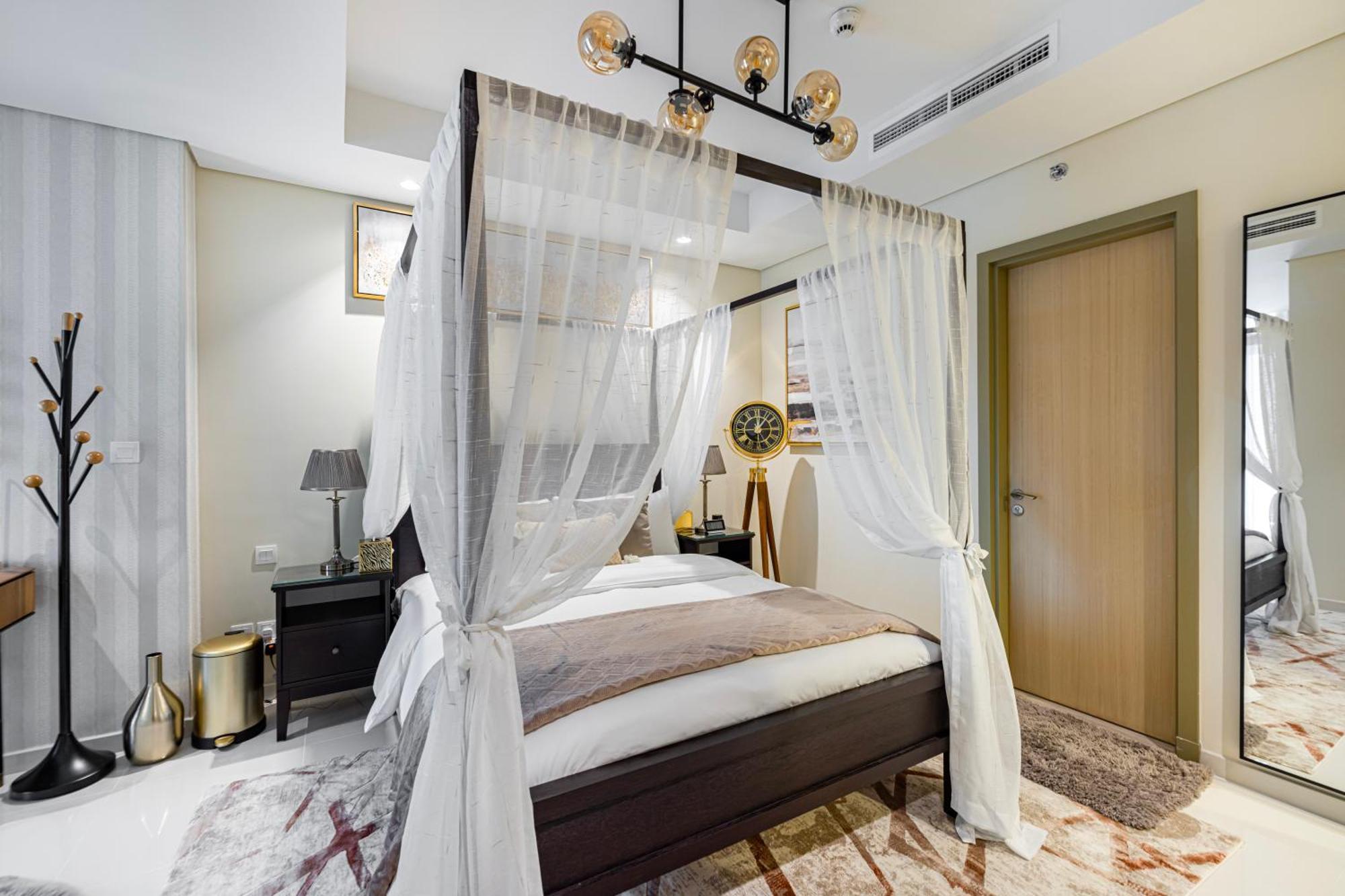 Сasa de vacaciones Stylish 2br At Paramount Midtown Dubái