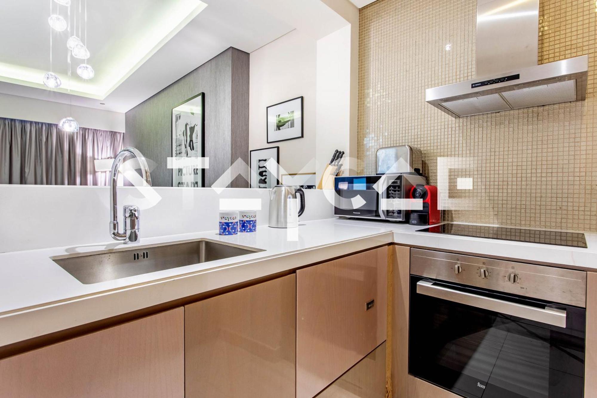 Staycae Homes - Damac Towers By Paramount Apartemen
