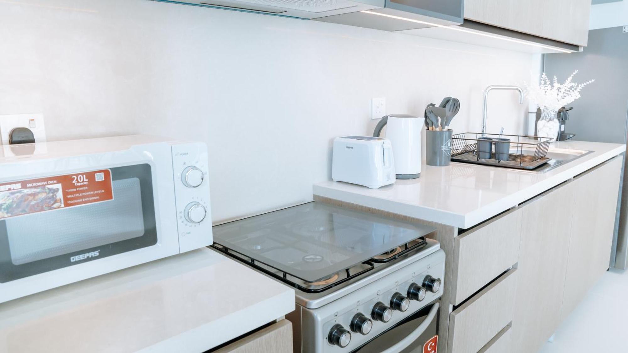 Modern 2br Near Mall & Burj Khalif Hébergement de vacances *