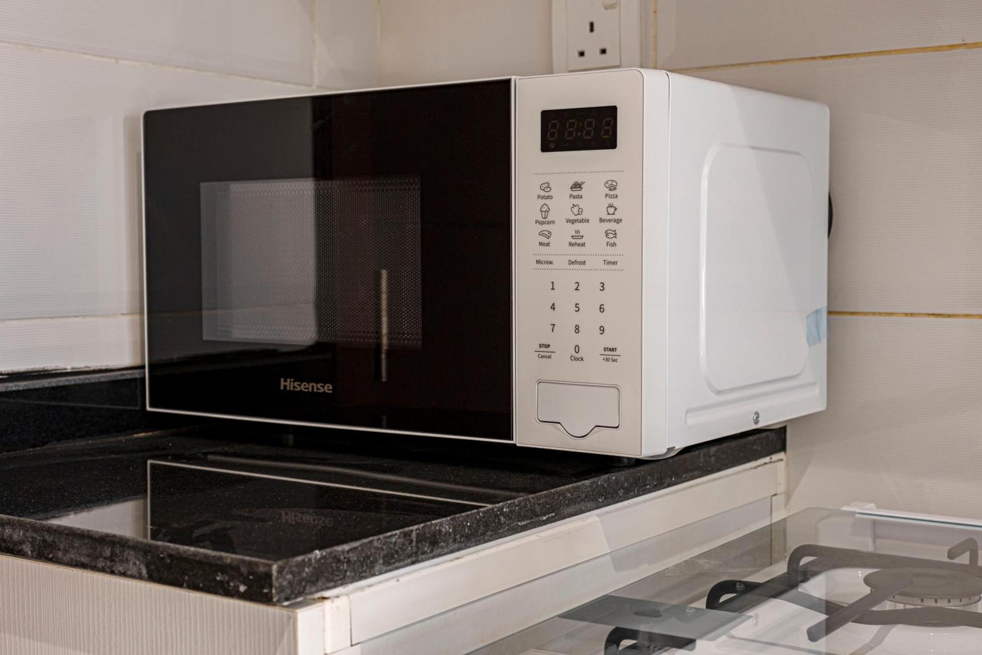 Cozy And Contemporary In Dubailand Apartemen
